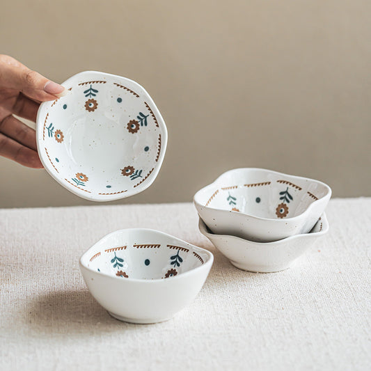 4 - Piece Assorted Ceramic Bowl Set: Unique Shapes with Floral Patterns for Whimsical Table Presentations